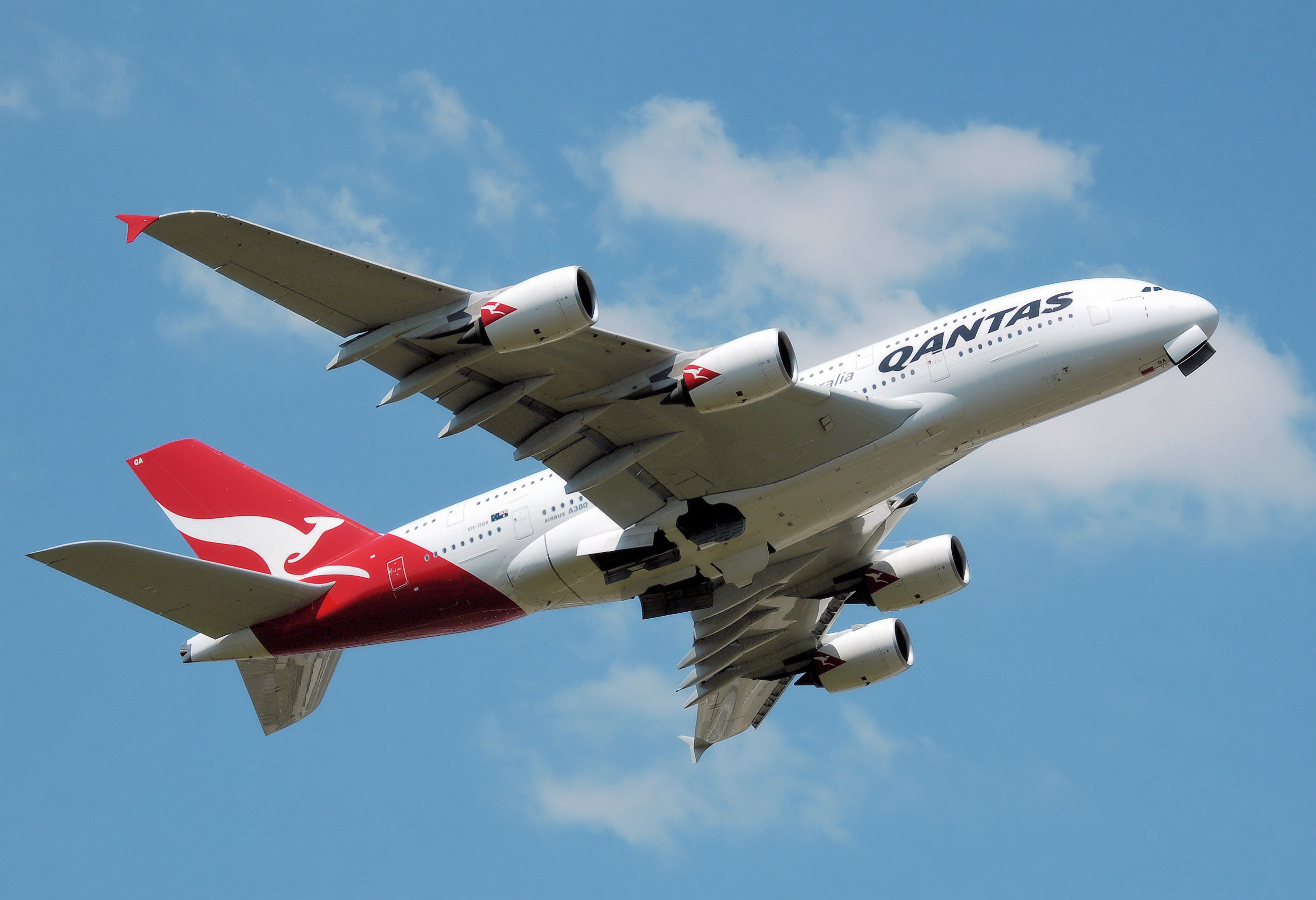 Cargo aircraft taking off at dusk, symbolising global material delivery